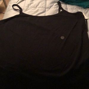 3 camisoles: Black, nude, and white